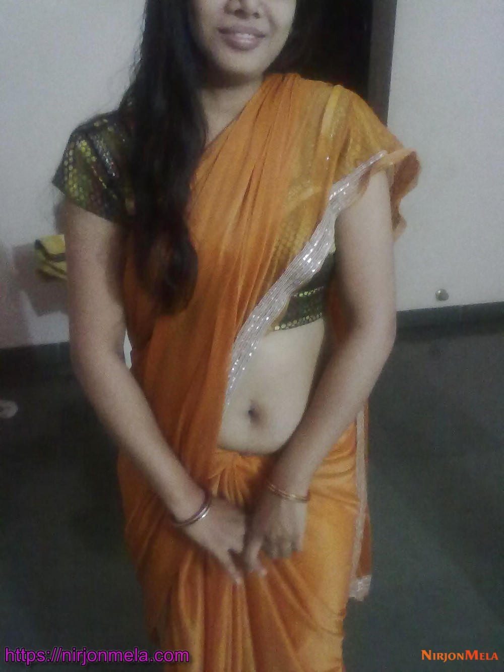 Indian-Sexy-Bhabhi-In-Yellow-Sari.jpg